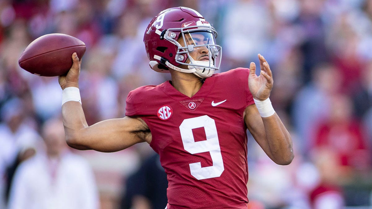 Alabama quarterback Bryce Young (9) throws against Arkansas during the first half of an NCAA college football game, Saturday, Nov. 20, 2021, in Tuscaloosa, Ala.