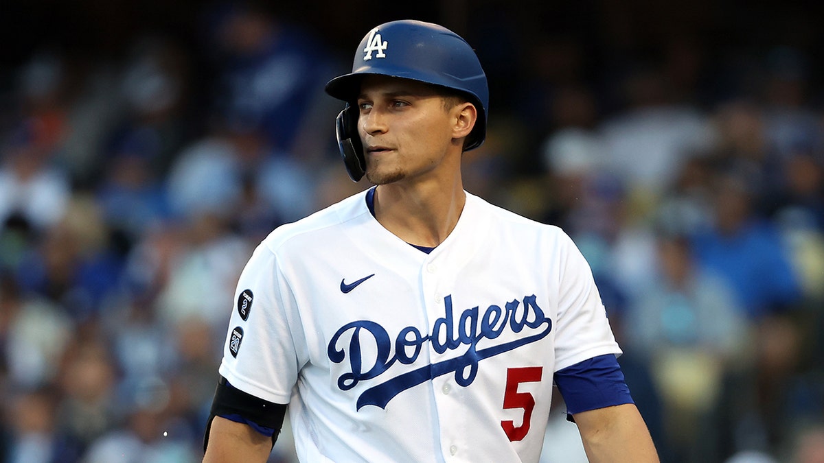 Corey Seager of the Los Angeles Dodgers strikes out during the seventh inning of Game 3 of the National League Championship Series against the Atlanta Braves at Dodger Stadium on Oct. 19, 2021, in Los Angeles, California.