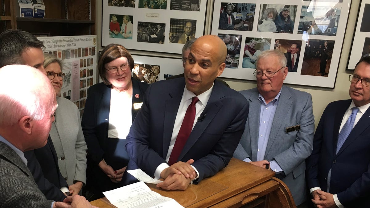 Sen. Cory Booker of New Jersey files to put his name of the New Hampshire presidential primary's Democratic ballot, in Concord, New Hampshire, on Nov. 15, 2019.