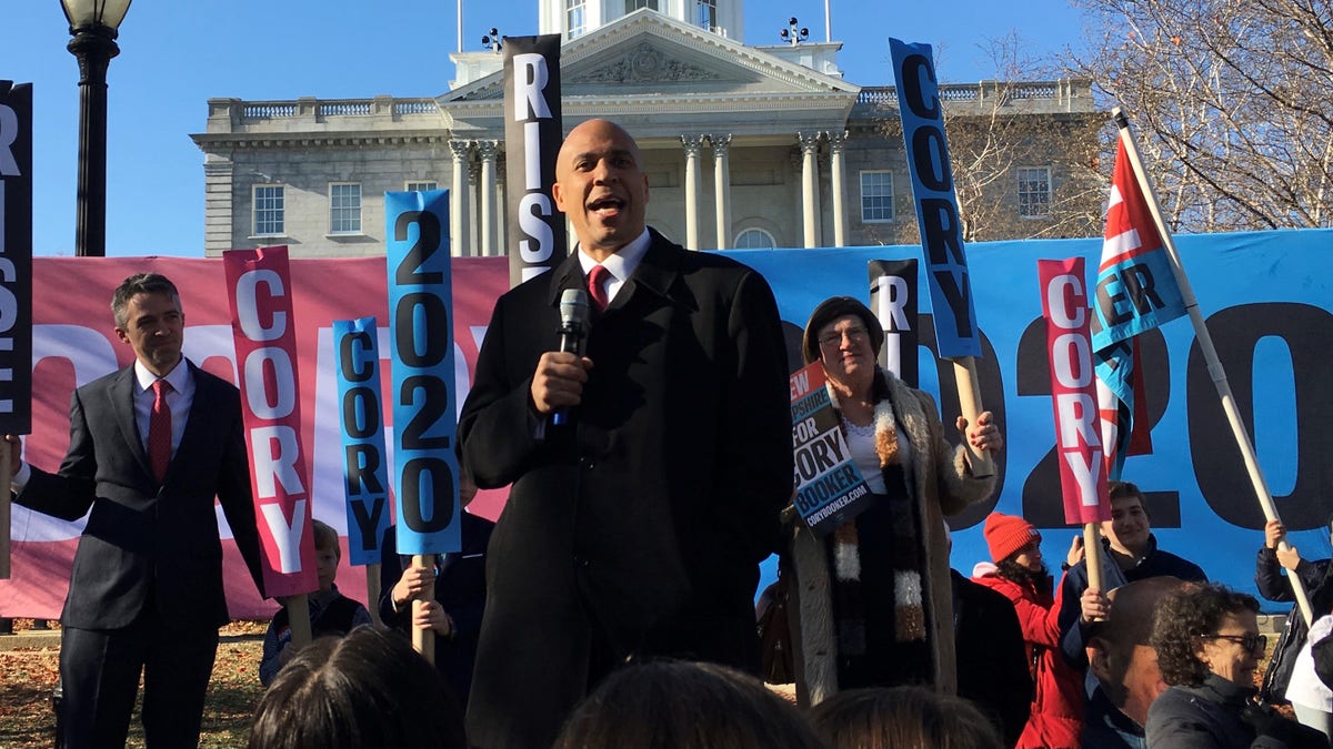 Sen. Cory Booker of New Jersey holds a campaign rally outside the New Hampshire state house as he runs for the Democratic presidential nomination, in Concord, New Hampshire, on Nov. 15, 2019.