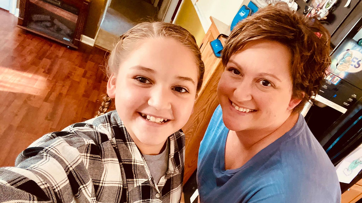 Jennifer Greene, a mom in Maryland, was shocked when she was ordering her 12-year-old daughter’s school photos and she noticed that there was an option for retouching. Greene and her daughter are pictured.