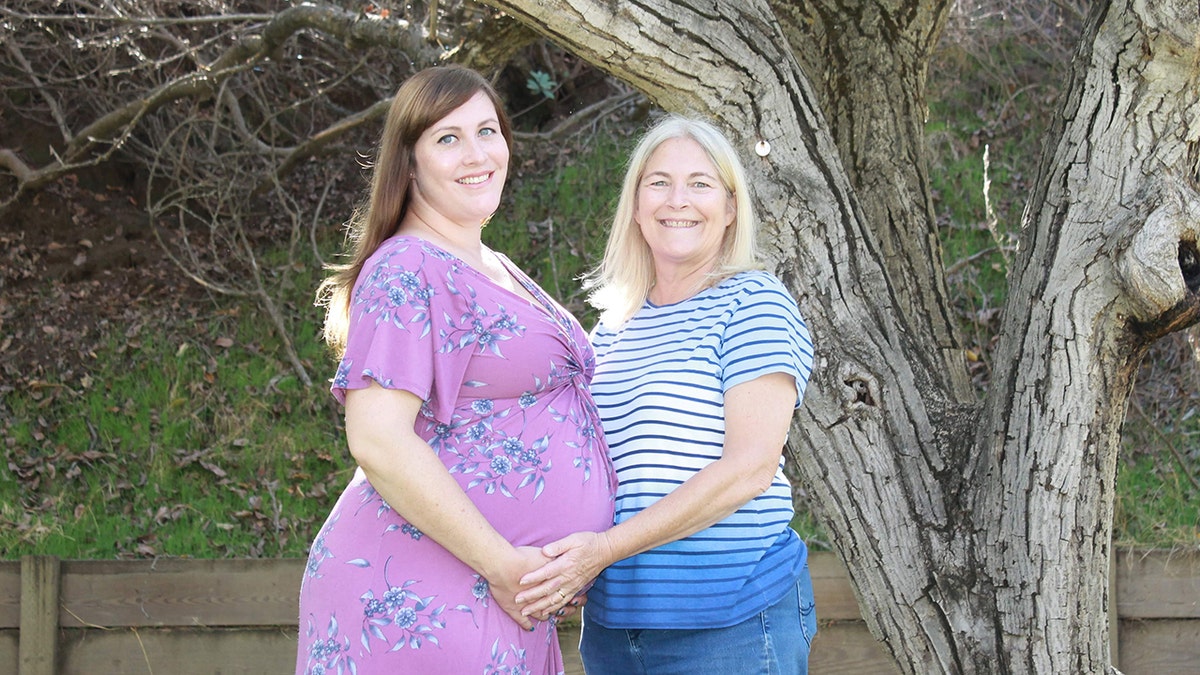 Emily Johnson (pictured left, with her mom) gave birth to her second son, Thomas, in her front lawn on Nov. 4. (Courtesy of Michael and Emily Johnson)