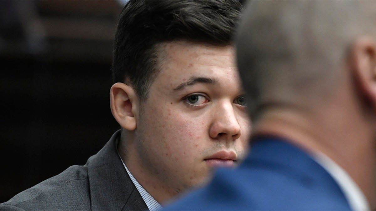 Kyle Rittenhouse listens as Judge Bruce Schroeder talks about how the jury will view video during deliberations in Rittenhouse's trial at the Kenosha County Courthouse in Kenosha, Wis., Wednesday, Nov. 17, 2021. 