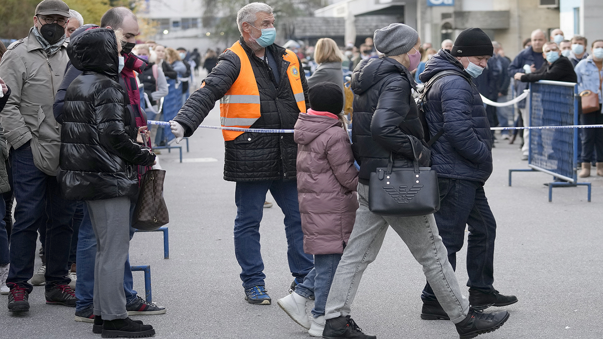 Russian citizens wait in line to get a COVID-19 vaccination in Zagreb, Croatia, on Tuesday. Croatia has become a new favorite spot for Russian citizens seeking vaccinations with Western jabs needed for travel around Europe and the U.S. 