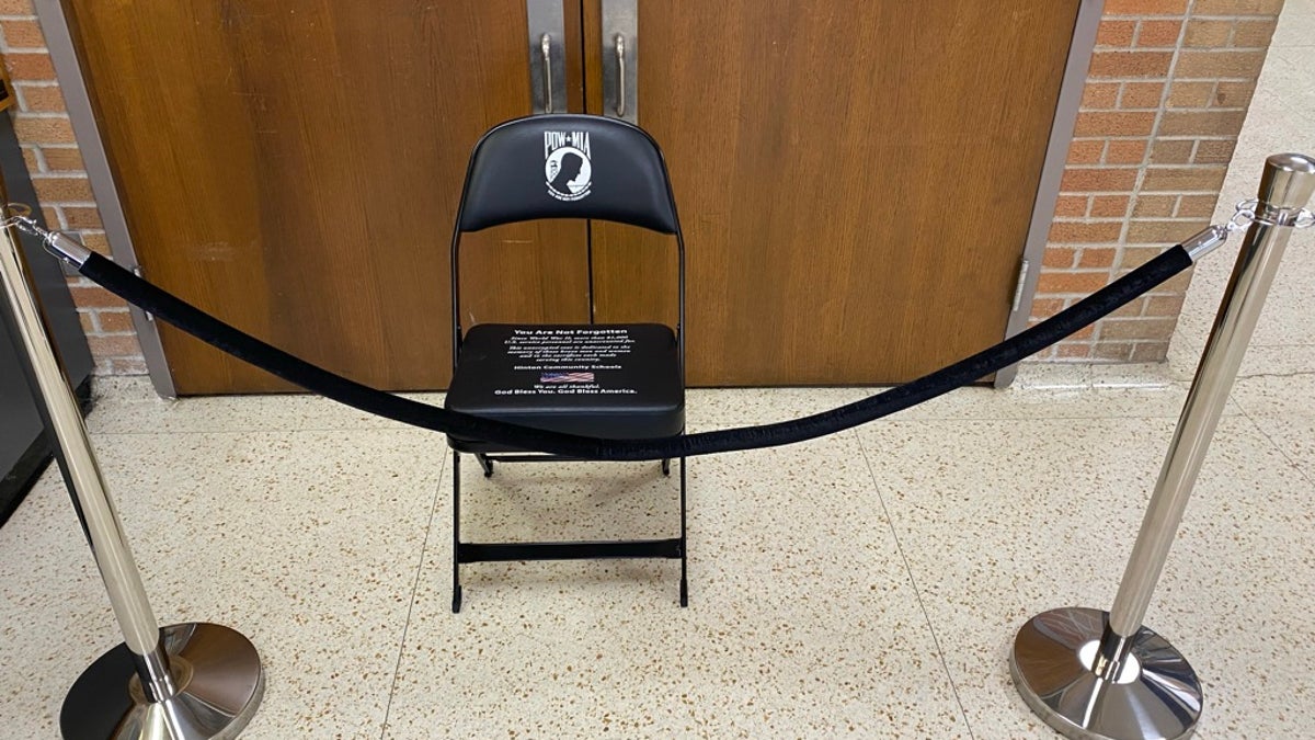 A Chair of Honor in remembrance of soldiers Missing in Action or Prisoners of War is seen Nov. 11, 2021. 