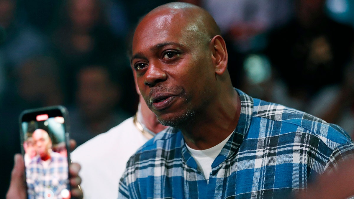 Comedian Dave Chappelle attends a boxing bout Nov. 6, 2021, in Las Vegas.