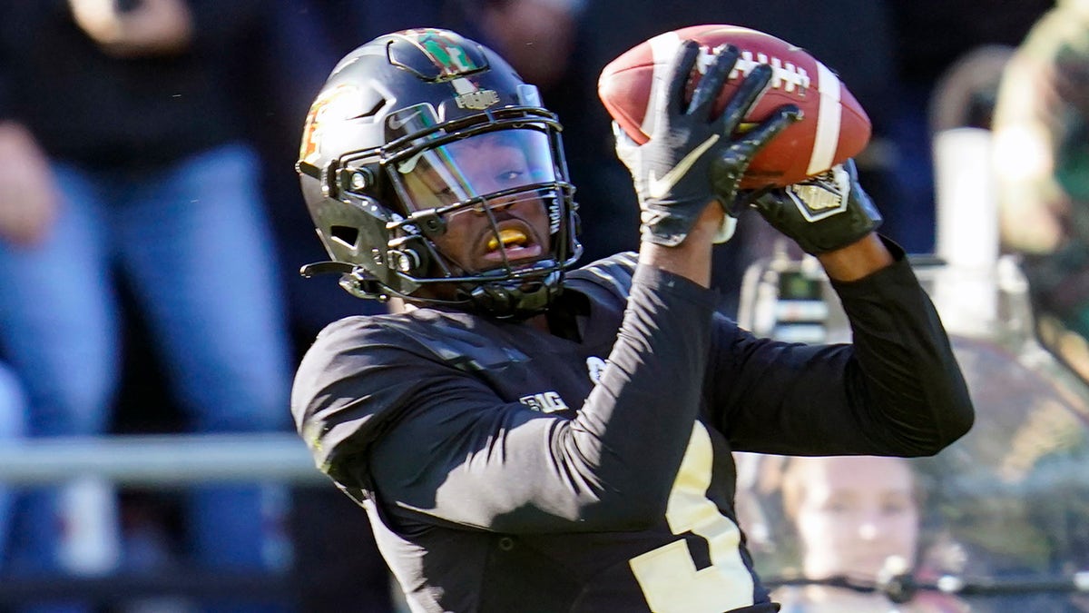 Purdue wide receiver David Bell (3) makes a catch for a touchdown against Michigan State during the first half of an NCAA college football game in West Lafayette, Ind., Saturday, Nov. 6, 2021.