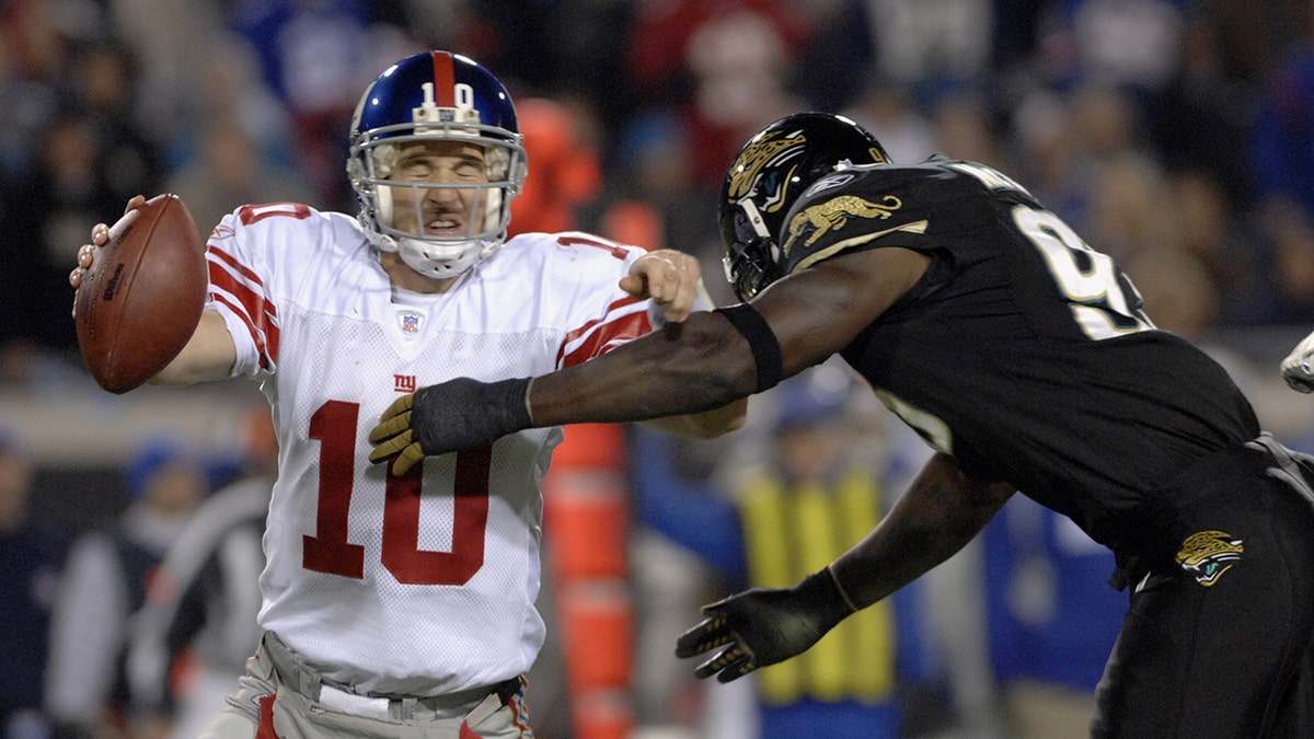 New York Giants quarterback Eli Manning faces  the Jacksonville Jaguars pass rush  on ESPN Monday Night Football Nov. 20, 2006 in Jacksonville. The Jaguars won 26 - 10.