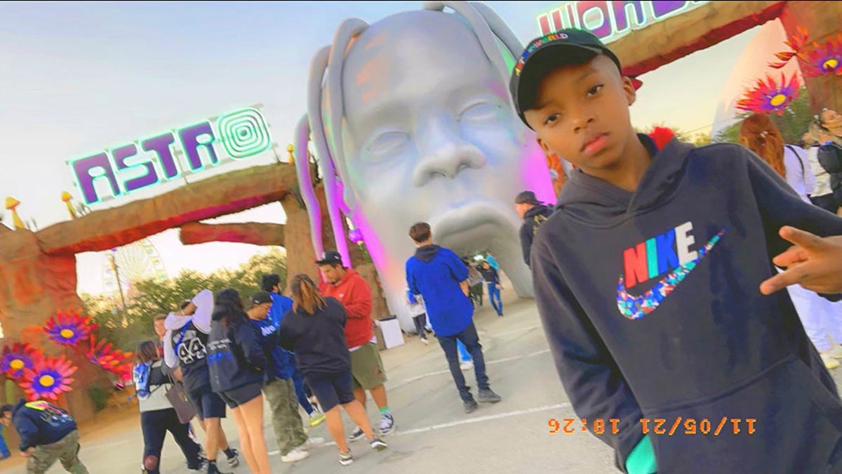 This photo provided by Taylor Blount shows Ezra Blount, 9, posing outside the Astroworld music festival in Houston on Nov. 5, 2021. (Courtesy of Taylor Blount via AP)