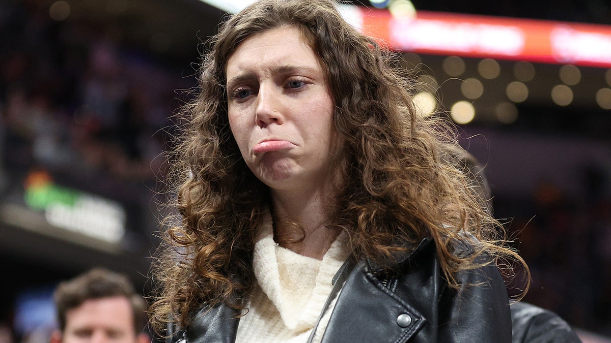 An unidentified fan is removed from the arena following a disturbance involving LeBron James of the Los Angeles Lakers during the game against the Indiana Pacers at Gainbridge Fieldhouse on Nov. 24, 2021, in Indianapolis, Indiana.