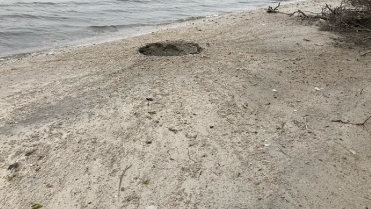 An explosion on Fox Island in New York left a crater