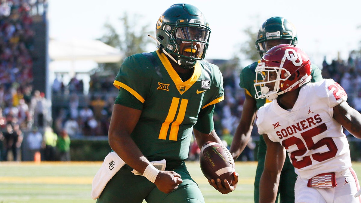 Baylor quarterback Gerry Bohanon scores on a 14-yard touchdown carry against the Oklahoma Sooners in Waco, Texas, on Nov. 13, 2021.