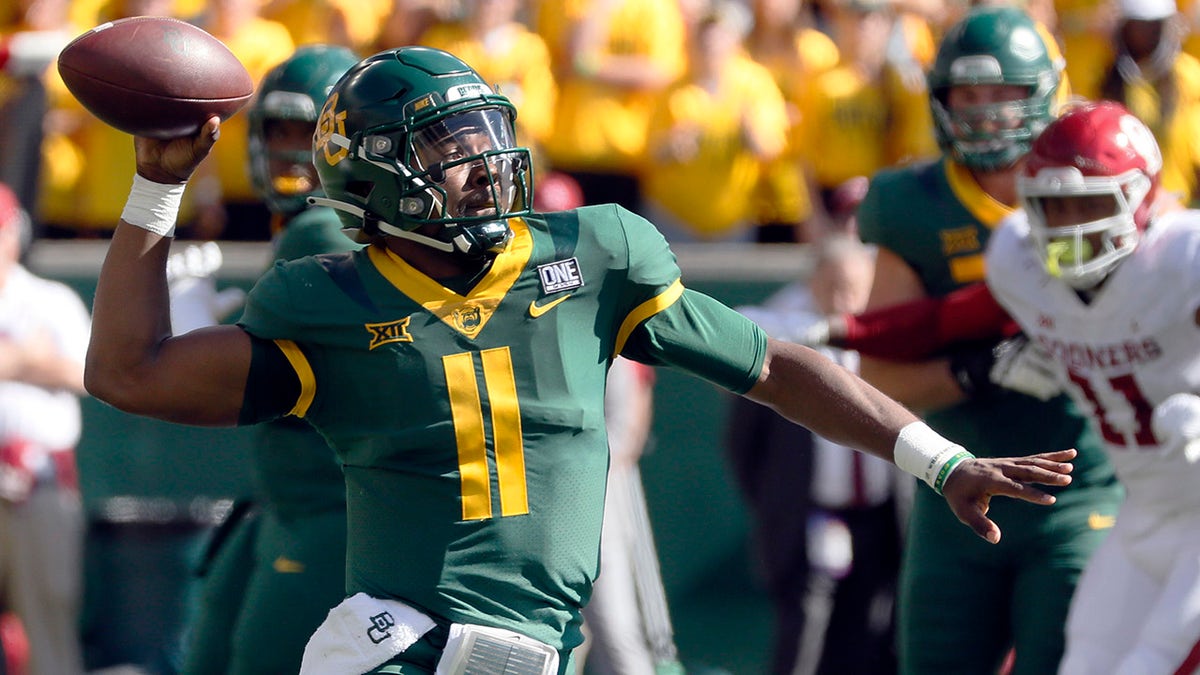 Baylor Bears quarterback Gerry Bohanon passes the ball down field against the Oklahoma Sooners during the first half in Waco, Texas, Saturday, Nov. 13, 2021. 