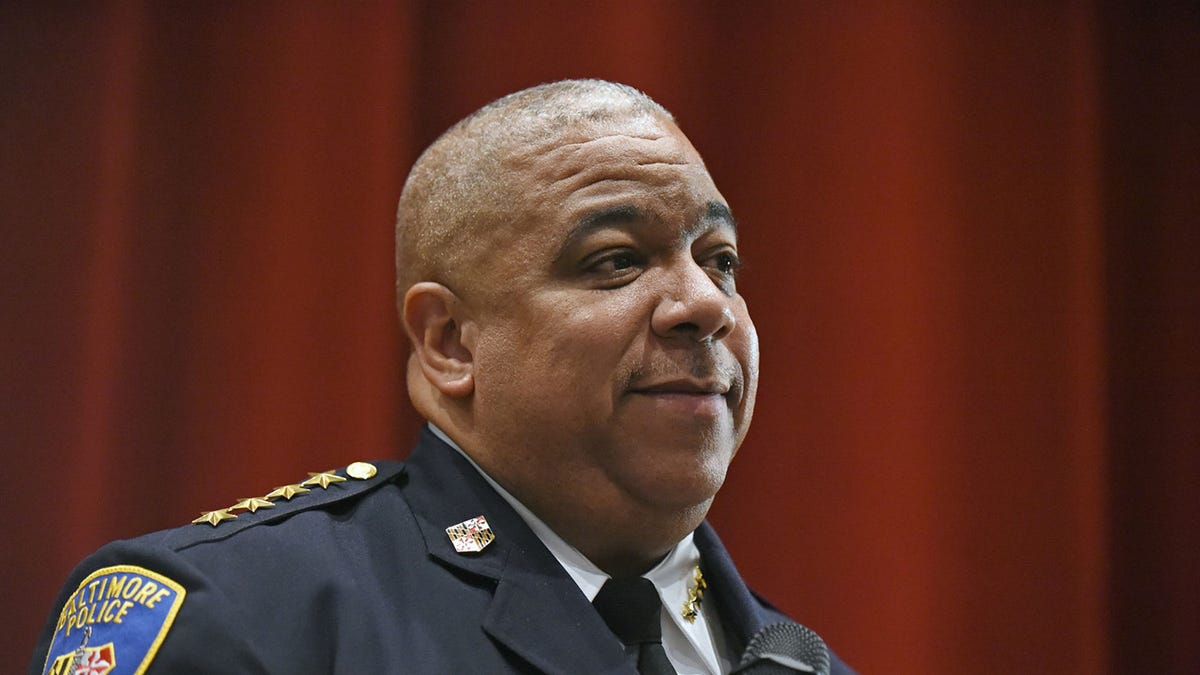 Baltimore Police Commissioner Michael Harrison speaks during a community meeting on Feb. 11, 2019, at Forest Park High School. 