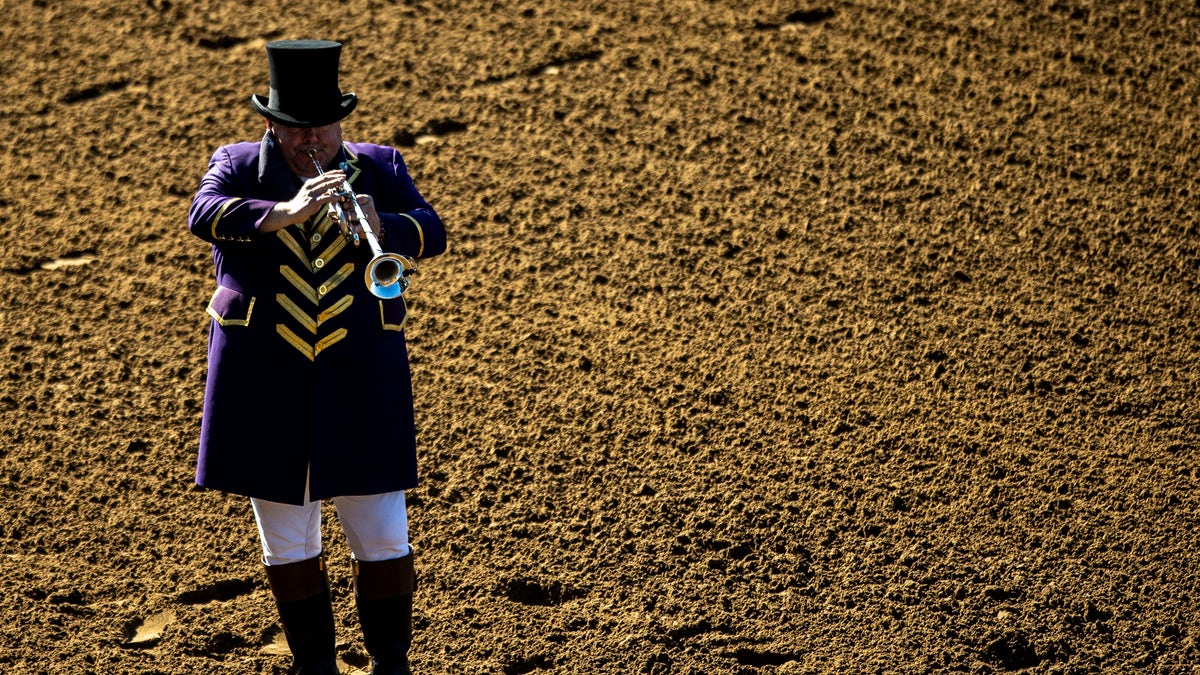 LEXINGTON, KY - NOVEMBER 07: The bugler gives the call for riders to mount their horses during the second day of the Breeders Cup at Keenland on November 7, 2020 in Lexington, Kentucky. (Photo by Bobby Ellis/Getty Images)