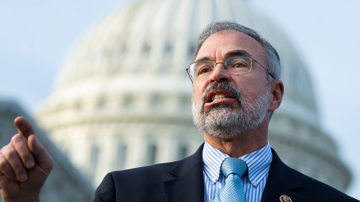 UNITED STATES - DECEMBER 3: Rep. Andy Harris, R-Md., and members of the House Freedom Caucus conduct a news conference to call on Attorney General William Barr to release findings of an investigation into allegations of 2020 election fraud, outside the Capitol on Thursday, December 3, 2020. (Photo By Tom Williams/CQ-Roll Call, Inc via Getty Images)