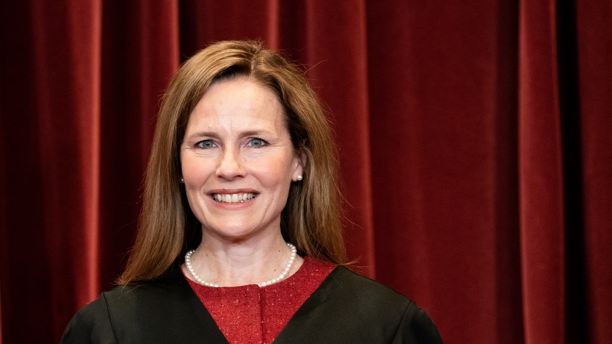 Associate Justice Amy Coney Barrett stands during a group photo of the Justices at the Supreme Court in Washington, D.C., on April 23, 2021. (Photo by Erin Schaff-Pool/Getty Images)