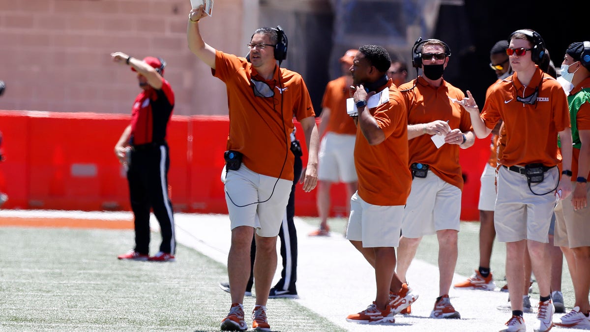 AUSTIN, TX - APRIL 24: University of Texas Long Horns assistant head coach Jeff Banks calls out a play during the spring football game on April 24, 2021, at Darrell K Royal - Texas Memorial Stadium in Austin, TX. (Photo by Adam Davis/Icon Sportswire via Getty Images)