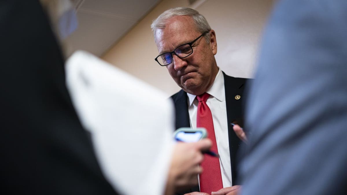 Sen. Kevin Cramer, a Republican from North Dakota, speaks with members of the media while arriving for a vote at the U.S. Capitol in Washington, D.C., on Tuesday, July 27, 2021. 