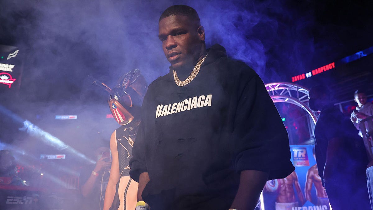 Xander Zayas (L) and Frank Gore (R) walking to the ring before Xanders fight against Dan Karpency at State Farm Arena on October 23, 2021 in Atlanta, Georgia. 