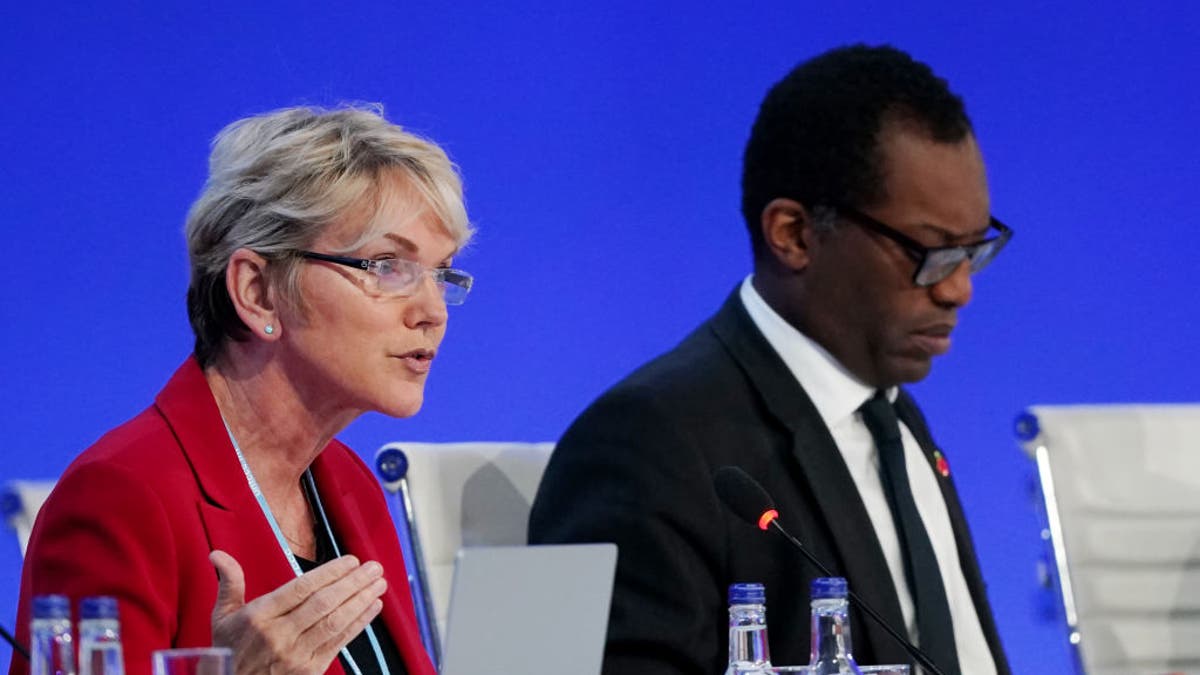 GLASGOW, SCOTLAND - NOVEMBER 04: U.S. Secretary of Energy Jennifer Granholm (L) and British Secretary of State for Business, Energy and Industrial Strategy Kwasi Kwarteng speak to delegates during day five of COP26 at SECC on November 3, 2021 in Glasgow, Scotland. Today COP26 will focus on accelerating the global transition to clean energy. The 2021 climate summit in Glasgow is the 26th "Conference of the Parties" and represents a gathering of all the countries signed on to the U.N. Framework Convention on Climate Change and the Paris Climate Agreement. The aim of this year's conference is to commit countries to net zero carbon emissions by 2050. (Photo by Ian Forsyth/Getty Images)