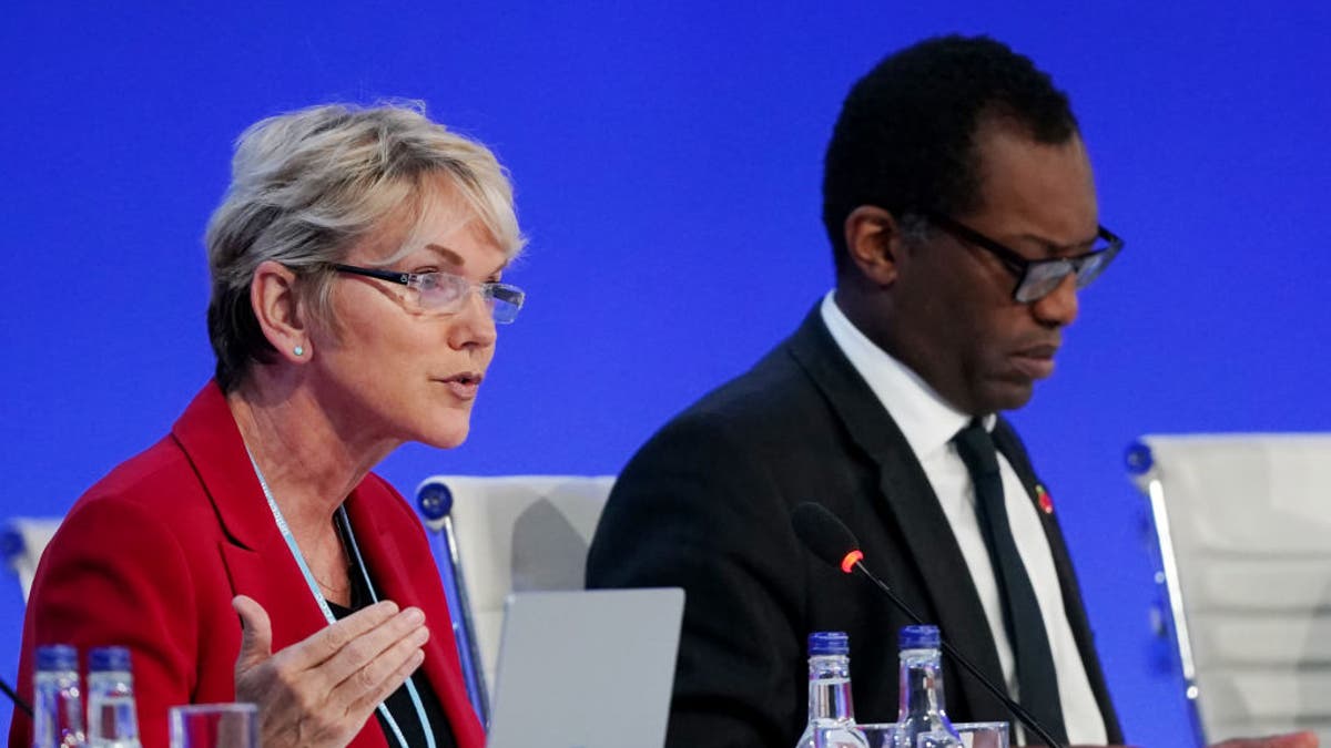 GLASGOW, SCOTLAND - NOVEMBER 04: U.S. Secretary of Energy Jennifer Granholm (L) and British Secretary of State for Business, Energy and Industrial Strategy Kwasi Kwarteng speak to delegates during day five of COP26 at SECC on November 3, 2021 in Glasgow, Scotland. Today COP26 will focus on accelerating the global transition to clean energy. The 2021 climate summit in Glasgow is the 26th "Conference of the Parties" and represents a gathering of all the countries signed on to the U.N. Framework Convention on Climate Change and the Paris Climate Agreement. The aim of this year's conference is to commit countries to net zero carbon emissions by 2050. (Photo by Ian Forsyth/Getty Images)