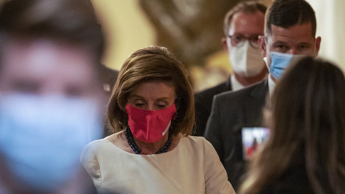 U.S. House Speaker Nancy Pelosi, a Democrat from California, returns to her office at the U.S. Capitol in Washington, D.C., U.S., on Thursday, Nov. 4, 2021. House Democrats appear close to votes as early as today on the White House's $1.75 billion tax and spending plan and accompanying bipartisan infrastructure plan, even as negotiations continue among the caucuses in both chambers.?