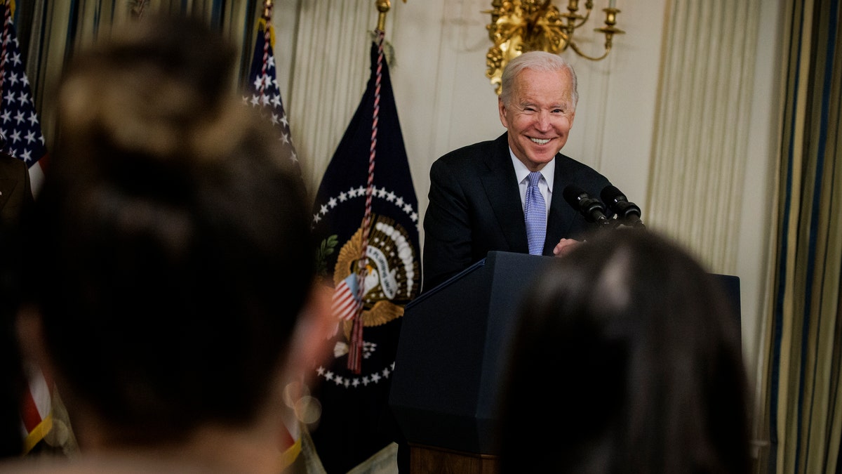 President Biden speaks to reporters in the State Dinning Room at the White House on Nov. 6, 2021, in Washington. 