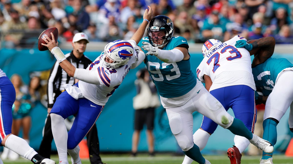 Quarterback Josh Allen of the Buffalo Bills is tackled short of the News  Photo - Getty Images