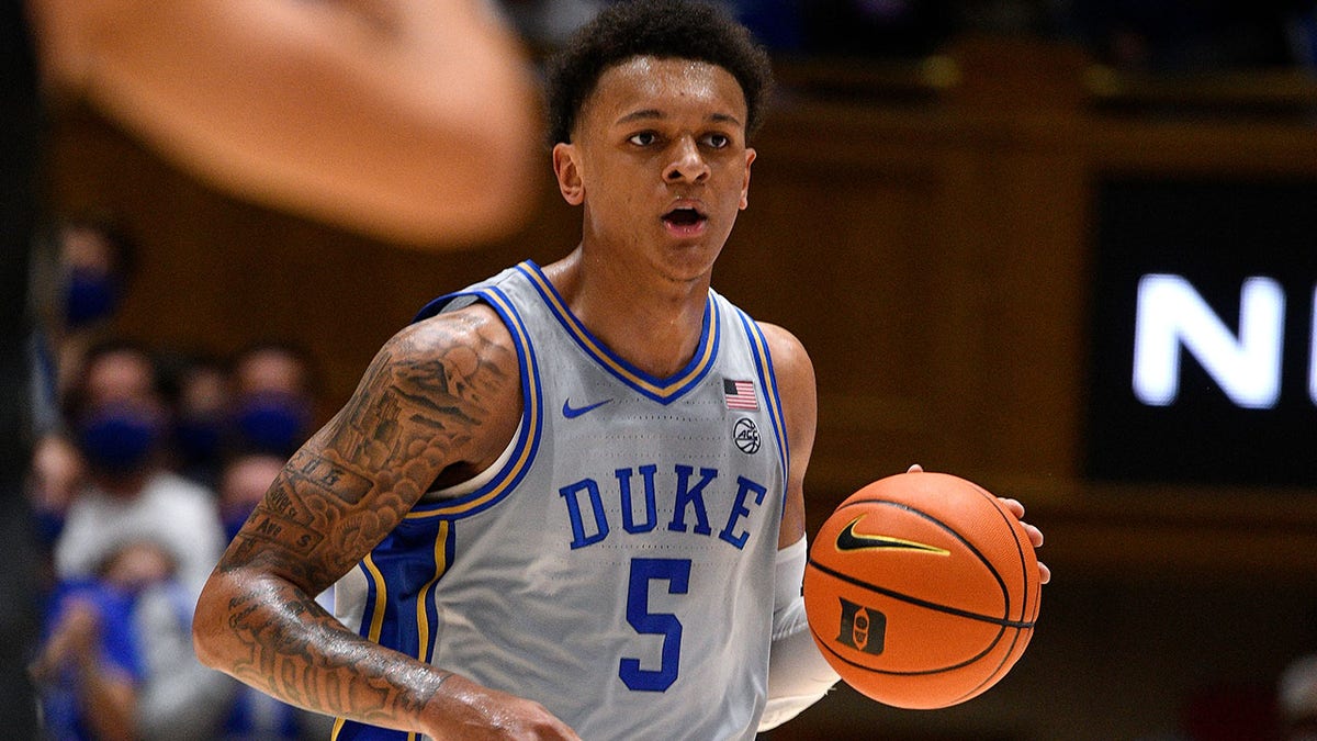 Paolo Banchero #5 of the Duke Blue Devils dribbles up court against the Army Black Knights during the first half at Cameron Indoor Stadium on November 12, 2021 in Durham, North Carolina.