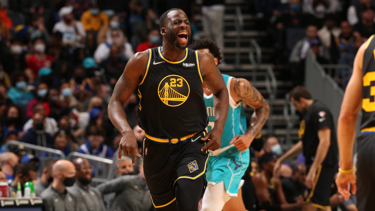 CHARLOTTE, NC - NOVEMBER 14: Draymond Green #23 of the Golden State Warriors celebrates during the game against the Charlotte Hornets on November 14, 2021 at Spectrum Center in Charlotte, North Carolina. NOTE TO USER: User expressly acknowledges and agrees that, by downloading and or using this photograph, User is consenting to the terms and conditions of the Getty Images License Agreement. Mandatory Copyright Notice: Copyright 2021 NBAE (Photo by Kent Smith/NBAE via Getty Images)