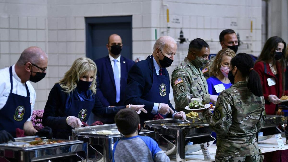 Biden serves food to military members