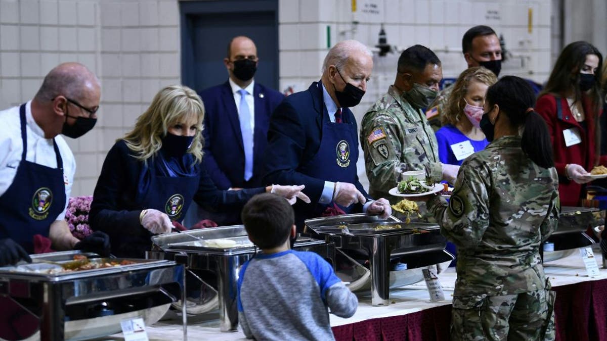 Biden serves food to military members