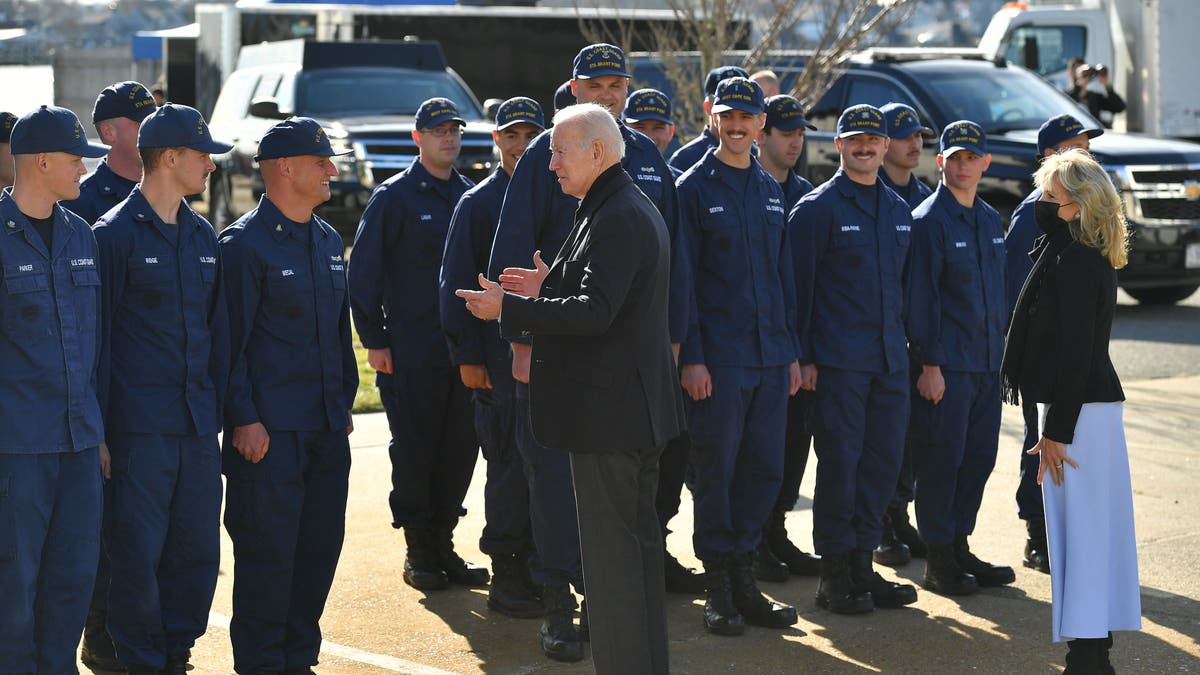 President Biden and first lady Jill Biden greet members of the Coast Guard.