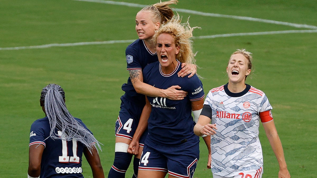 LOUISVILLE, KENTUCKY - AUGUST 18: Paulina Dudek #4 and Kheira Hamraoui #14 of Paris Saint-Germain celebrate a goal by Hamraoui during the second half against FC Bayern Munich at Lynn Family Stadium on August 18, 2021 in Louisville, Kentucky. (Photo by Tim Nwachukwu/Getty Images)