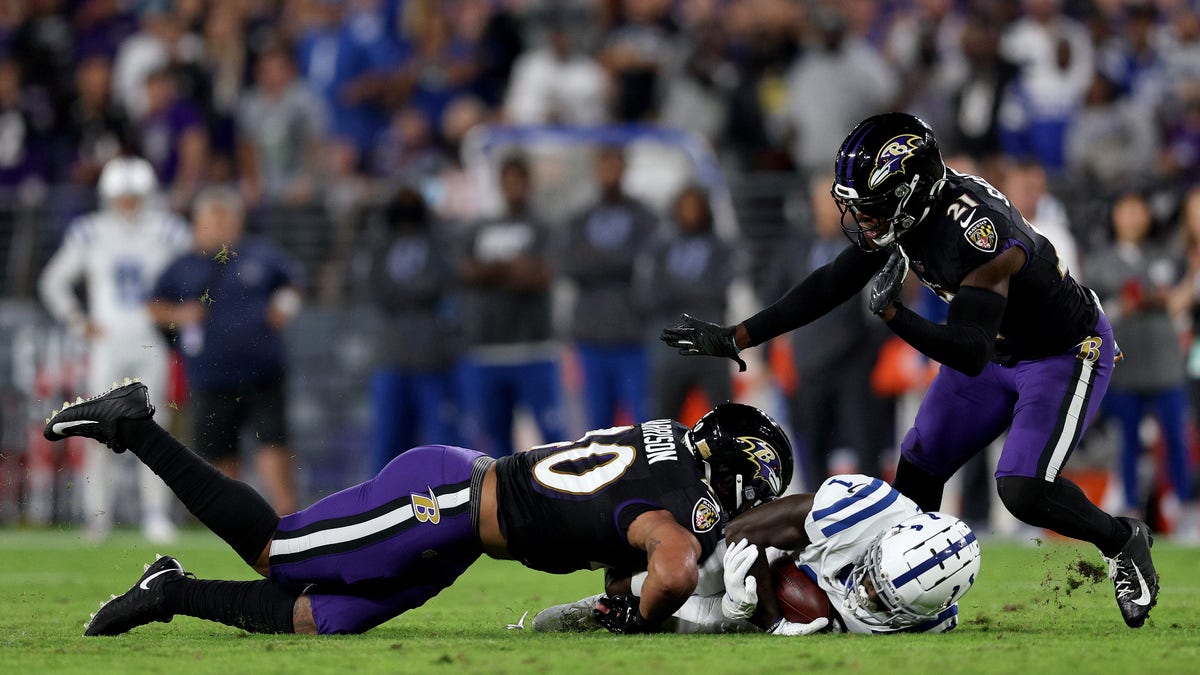 BALTIMORE, MARYLAND - OCTOBER 11: Parris Campbell #1 of the Indianapolis Colts is tackled by Malik Harrison #40 of the Baltimore Ravens during the first quarter in a game  at M&amp;amp;T Bank Stadium on October 11, 2021 in Baltimore, Maryland. (Photo by Patrick Smith/Getty Images)