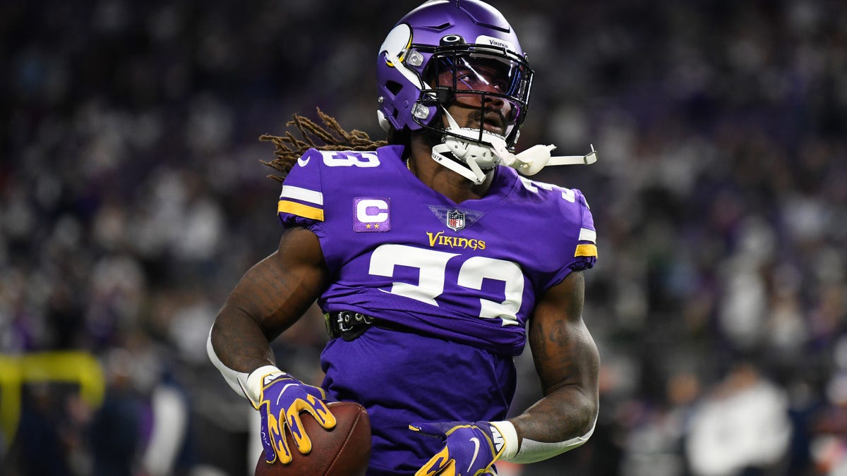 Dalvin Cook #33 of the Minnesota Vikings warms up prior to the game against the Dallas Cowboys at U.S. Bank Stadium on October 31, 2021 in Minneapolis, Minnesota.