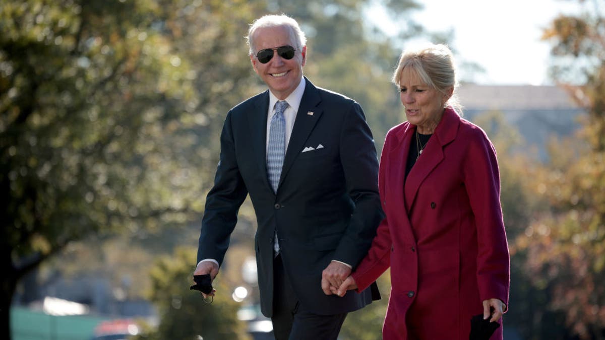 President Joe Biden and first lady Jill Biden return to the White House on Nov. 8, 2021, in Washington, D.C. (Photo by Win McNamee/Getty Images)