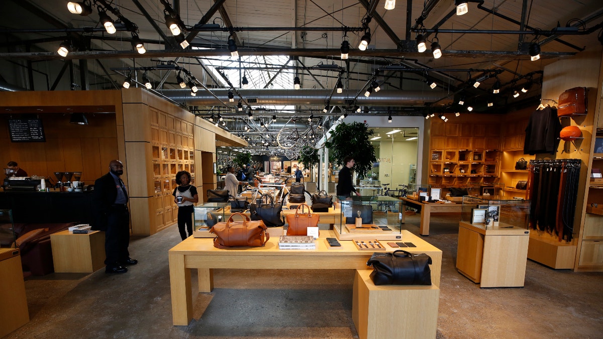 The Shinola store is seen on January 6, 2017 in Detroit, Michigan. Stchekine,was the first official Shinola employee hired in the Detroit flagship location. Shinola, a young American company, is trying to make its mark by reinventing an iconic brand and selling products made in the USA like bicycles and watches manufactured in the industrial wastelands of Detroit. / AFP / JEFF KOWALSKY / TO GO WITH AFP STORY BY LUC OLINGA - Globalization-US-politics-manufacturing-Shinola (Photo credit should read JEFF KOWALSKY/AFP via Getty Images)