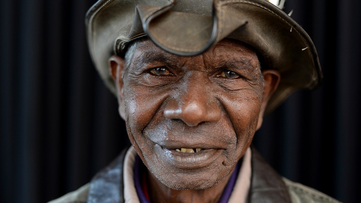 Australian Indigenous actor David Gulpilil, winner of the Red Ochre, the major award at the 6th National Indigenous Arts Awards, poses for a photograph at The Sydney Opera House, Sydney on Monday, May 27, 2013.