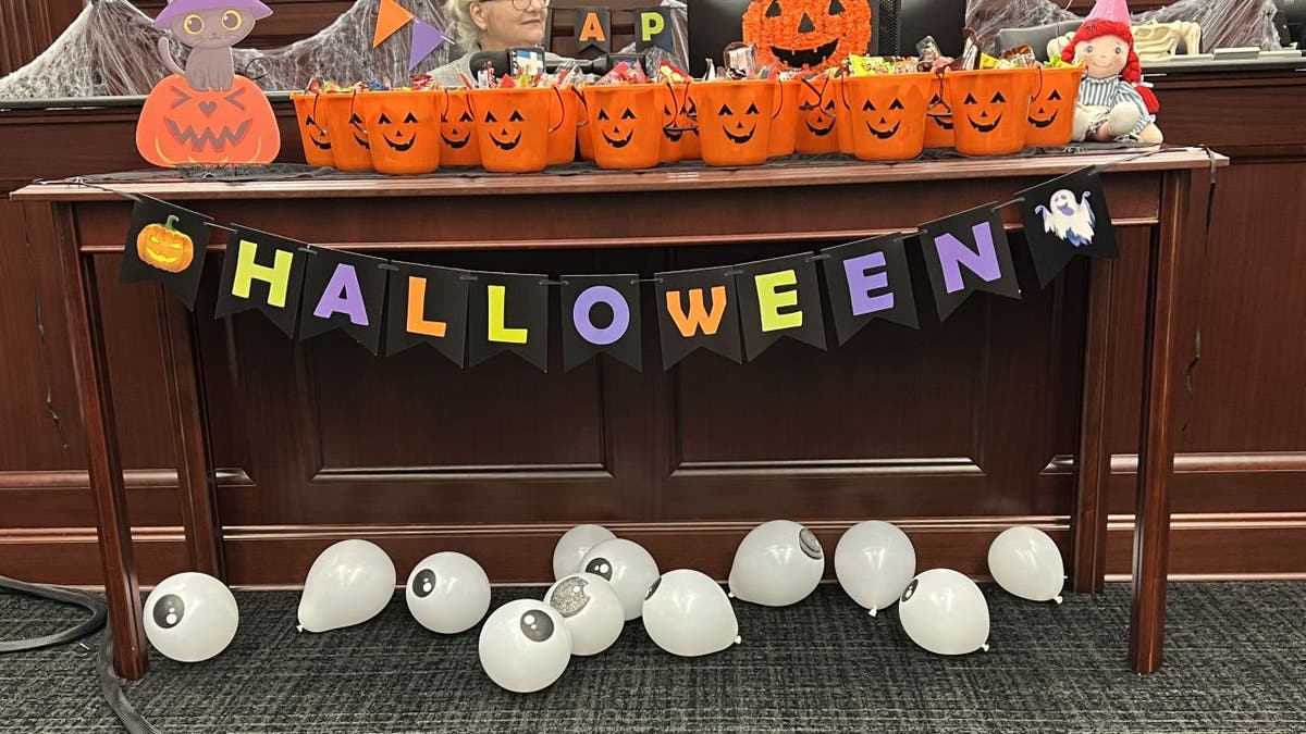 Officials at the Duval County Courthouse and Family Support Services of North Florida Inc. organized a Halloween-themed adoption ceremony in Jacksonville, Florida.