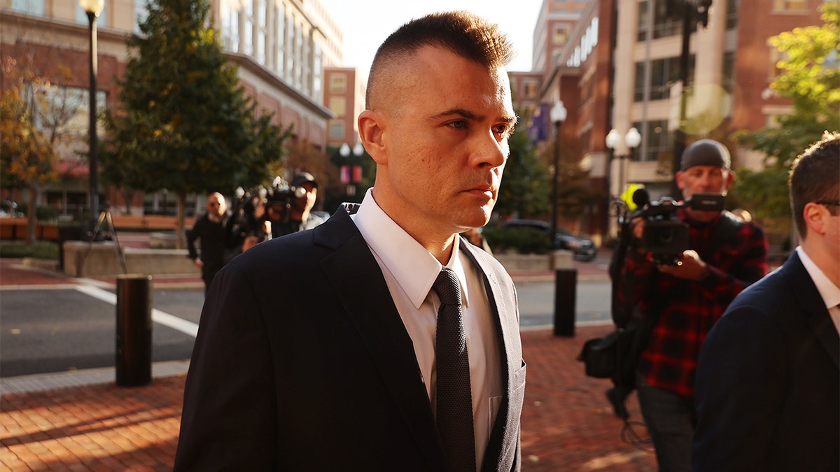 Russian analyst Igor Danchenko arrives at the Albert V. Bryan U.S. Courthouse before being arraigned on Nov. 10, 2021 in Alexandria, Virginia.