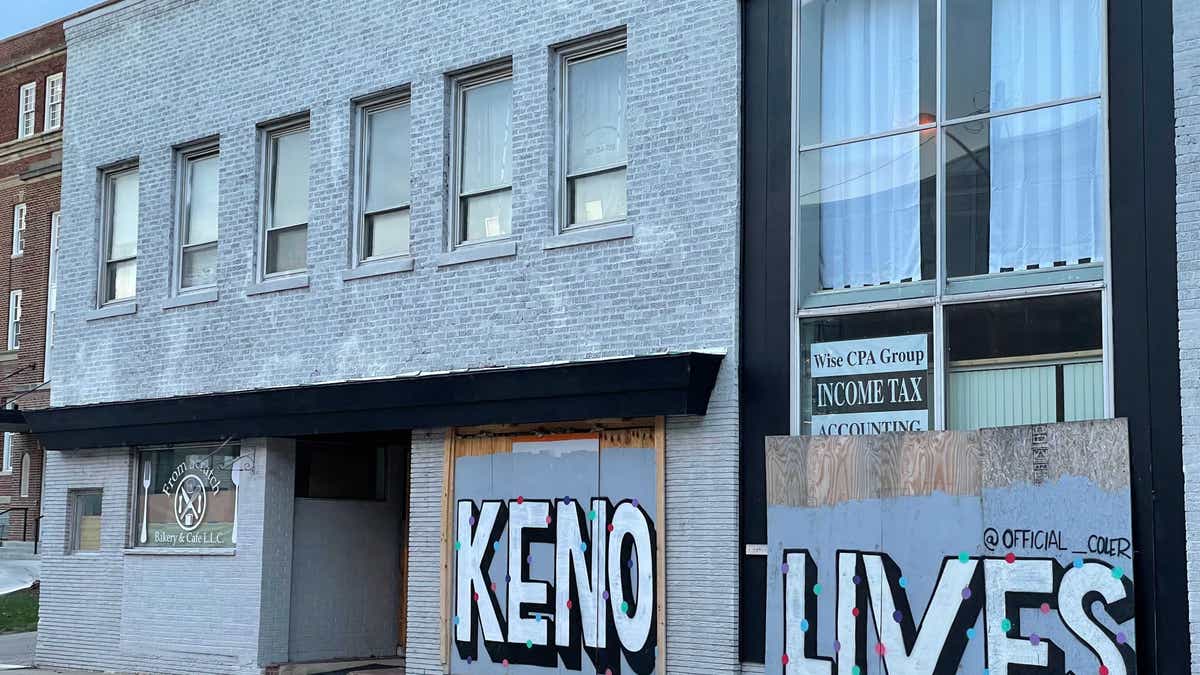 Boarded up storefronts appear along the stretch of Sheridan Road in Kenosha, Wisconsin, that saw a deadly protest last summer.