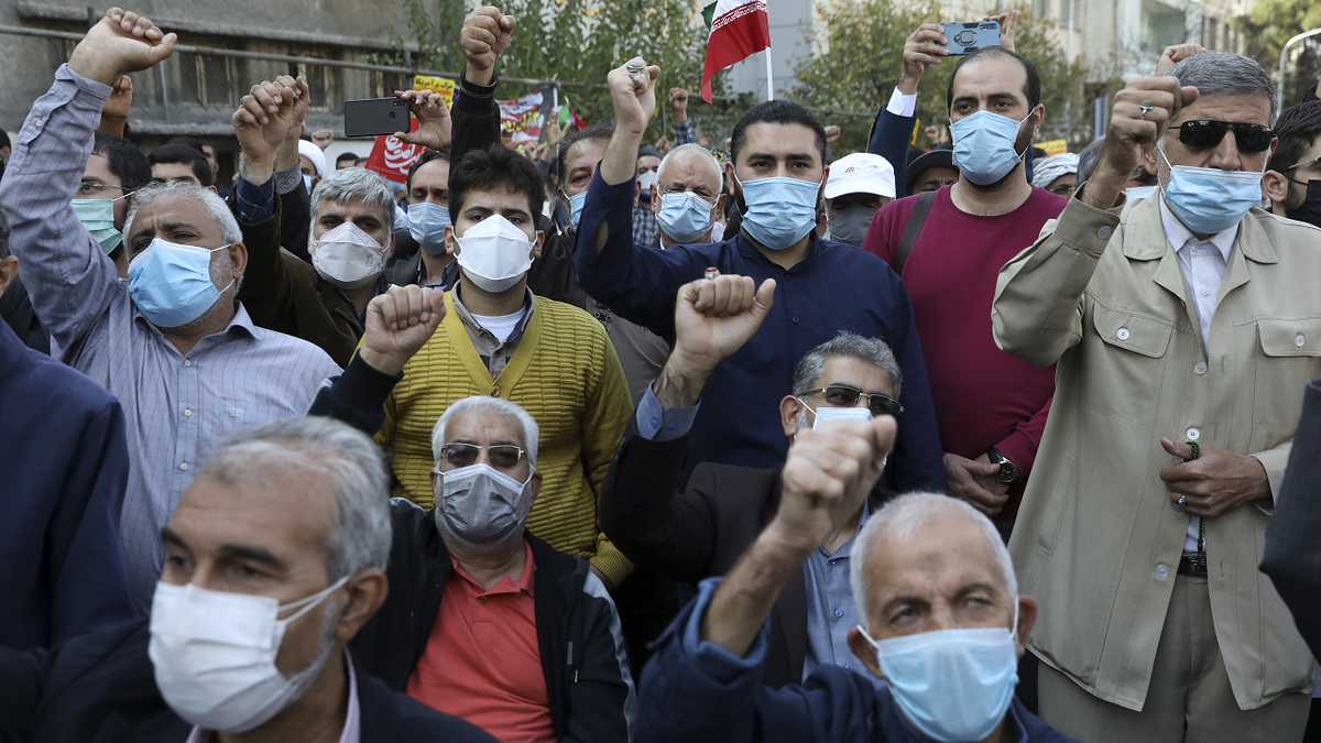 Demonstrators chant slogans during a rally in front of the former U.S. Embassy on Thursday.