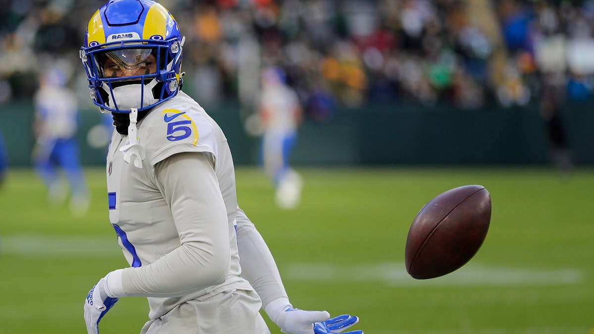 Los Angeles Rams' Jalen Ramsey warms up before an NFL football game against the Green Bay Packers Sunday, Nov. 28, 2021, in Green Bay, Wisconsin.