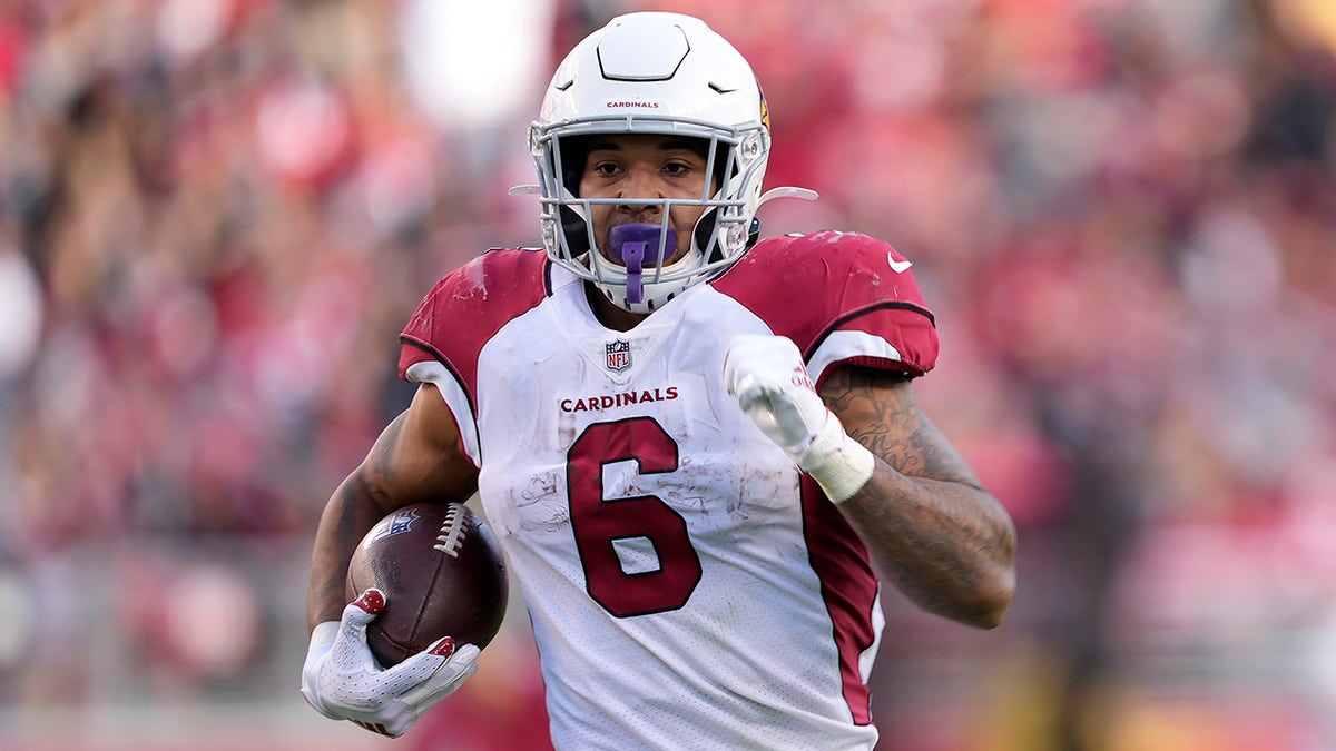 Arizona Cardinals running back James Conner runs toward the end zone to score against the San Francisco 49ers during the second half of an NFL football game in Santa Clara, California, Sunday, Nov. 7, 2021.