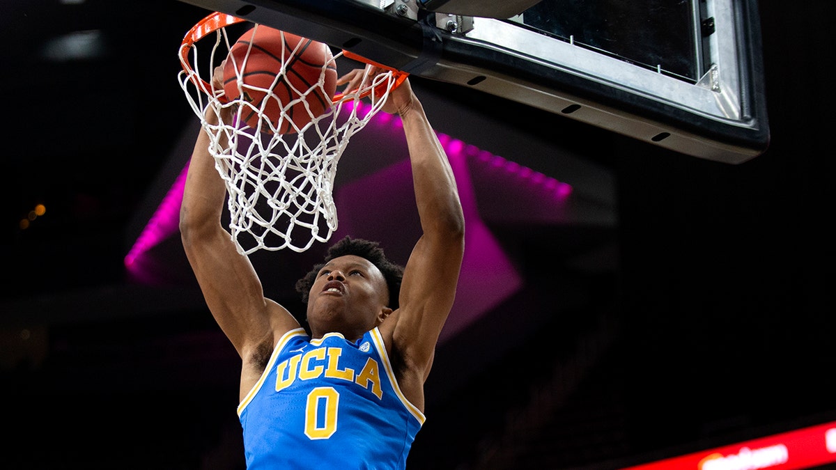 UCLA guard Jaylen Clark dunks against Bellarmine during the first half of an NCAA college basketball game Monday, Nov. 22, 2021, in Las Vegas.