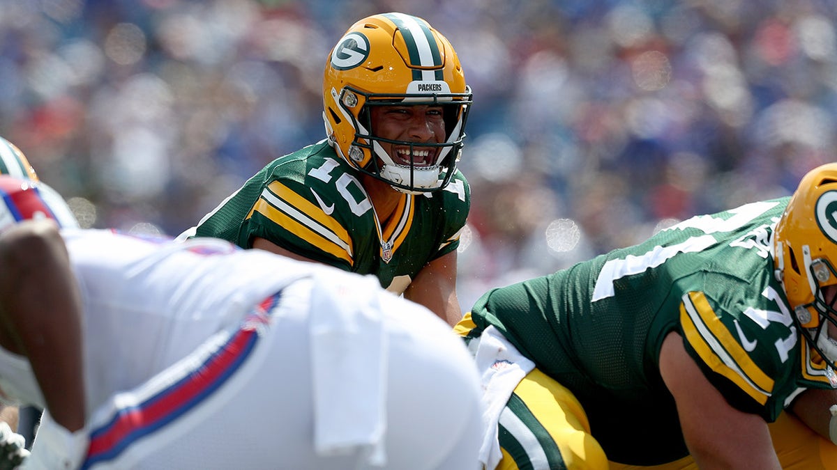Jordan Love of the Green Bay Packers waits for the snap against the Buffalo Bills at Highmark Stadium on Aug. 28, 2021, in Orchard Park, New York.