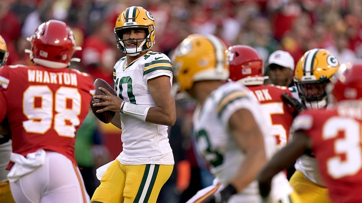 Green Bay Packers quarterback Jordan Love drops back to pass during the first half of a game against the Kansas City Chiefs Sunday, Nov. 7, 2021, in Kansas City, Mo.