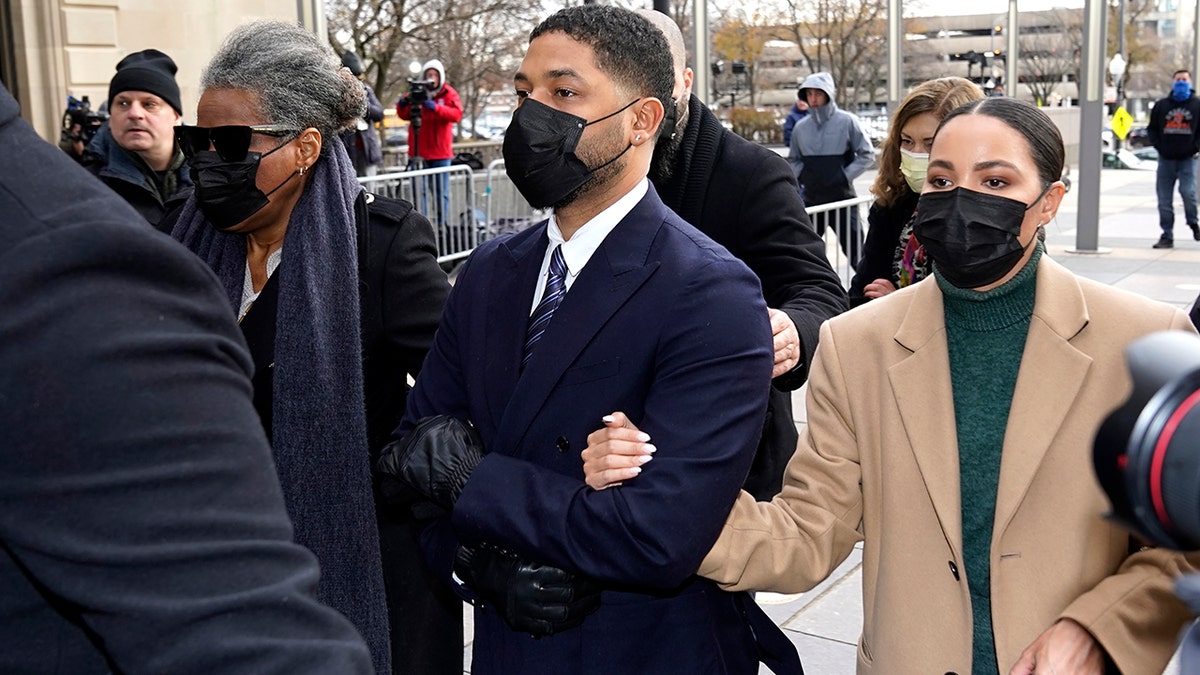 Actor Jussie Smollett arrives with family for the first day of his highly anticipated trial.